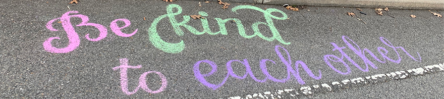 Banner with Chalk Drawing Saying 'Be Kind To Each Other'